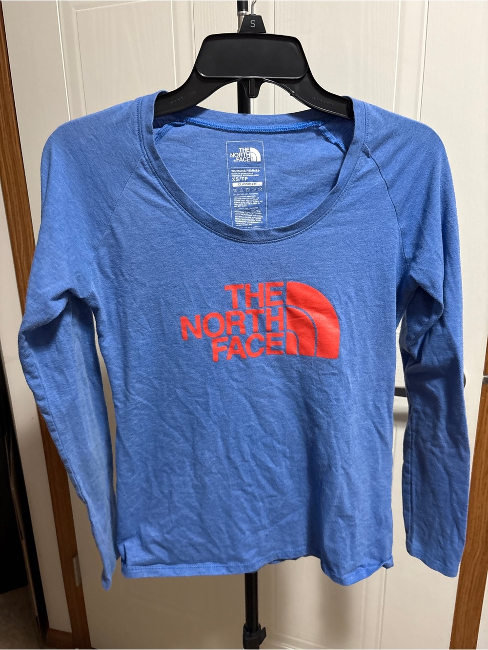 The North Face Women's Long Sleeve Crew Tee in Blue with Red Logo